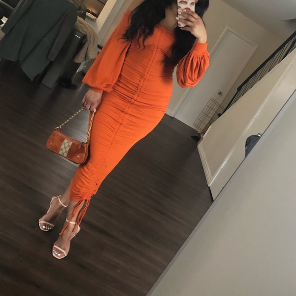 burnt orange ribbed balloon sleeve ruched midi dress